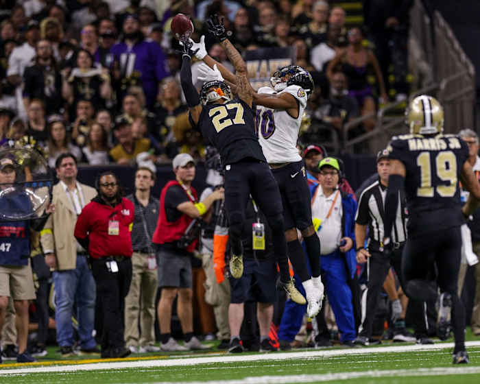 New Orleans Saints cornerback Alontae Taylor (27) breaks up a pass intended for Baltimore Ravens wide receiver Demarcus Robinson (10). Mandatory Credit: Stephen Lew-USA TODAY Sports